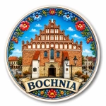 Magnes pamiątkowy z Bochni z motywem kościoła i dekoracyjnymi motywami kwiatowymi