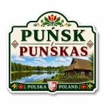 Magnes Puńsk z krajobrazem jeziora, tradycyjnym domem i motywami florystycznymi