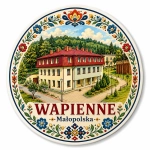 Magnes Wapienne z regionalnym motywem budynku i kwiatów