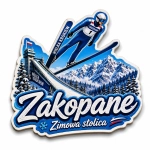 Magnes Zakopane ze skoczkiem narciarskim na tle ośnieżonych gór i lasów